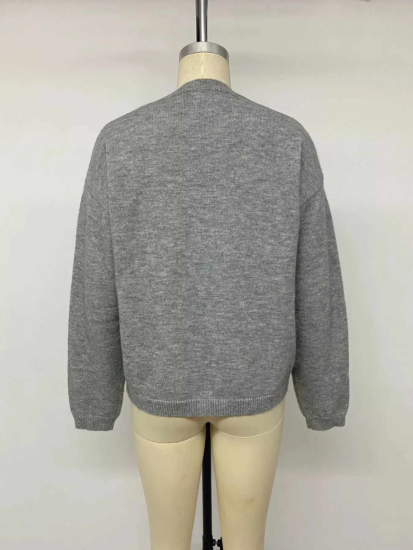 Star-Patterned Dropped Shoulder Sweater by Trendsi