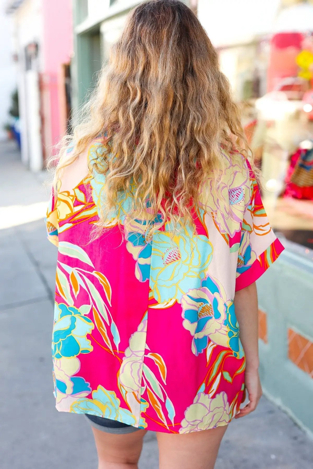 Fuchsia Floral Print Woven V Neck Top by Haptics