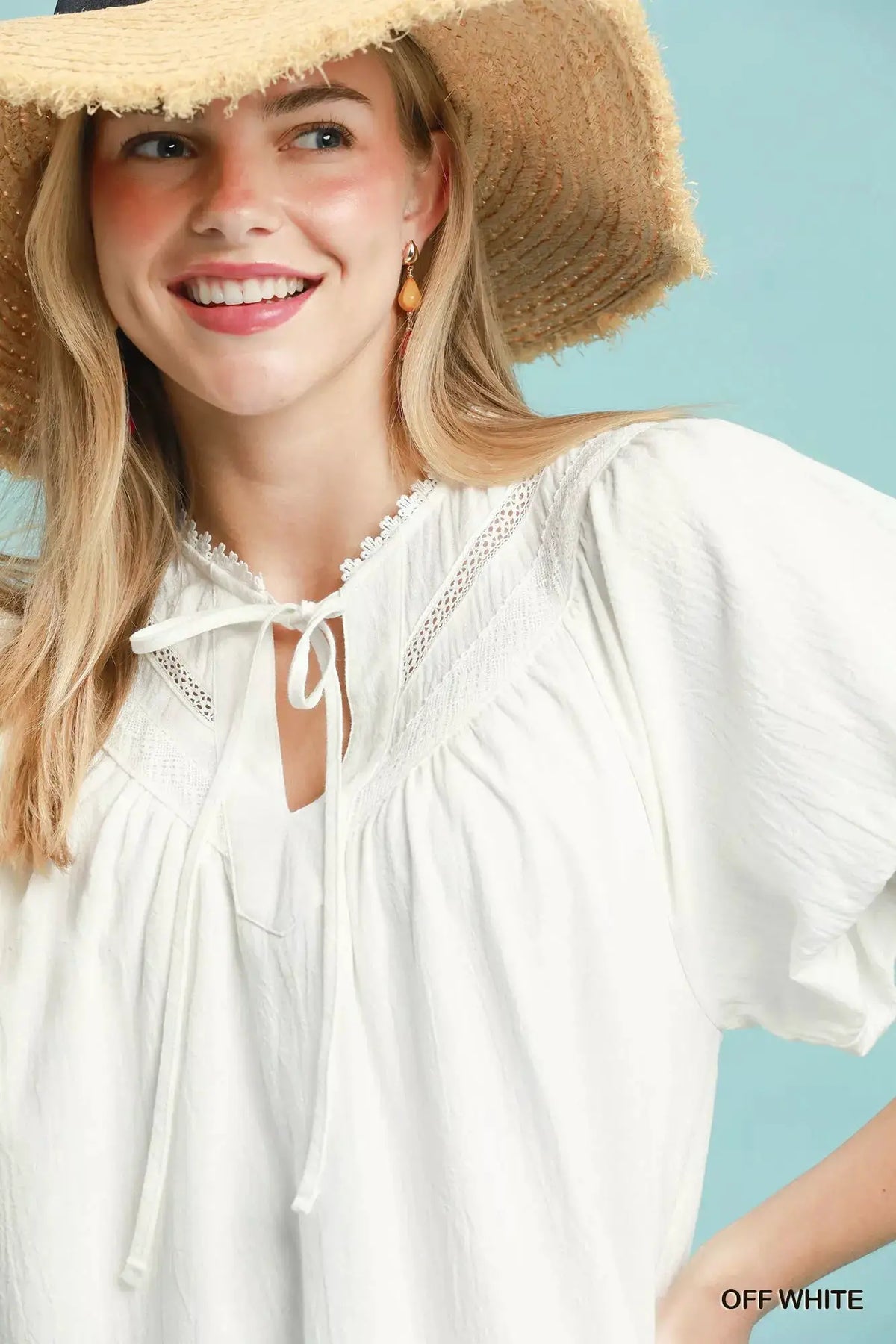 Umgee Flutter Sleeve Tassel Tie Ruffle Hem Mini Dress by Trendsi