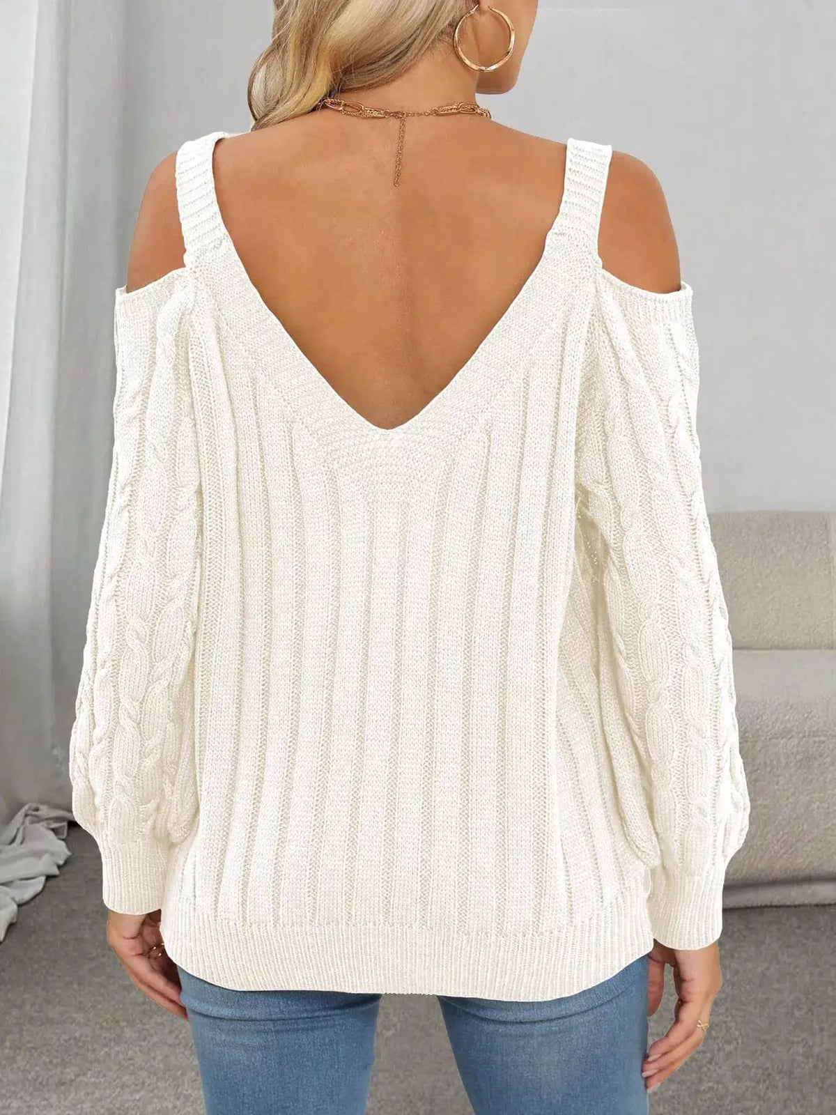 Floral Applique Cold Shoulder Cable Knit Sweater by Trendsi