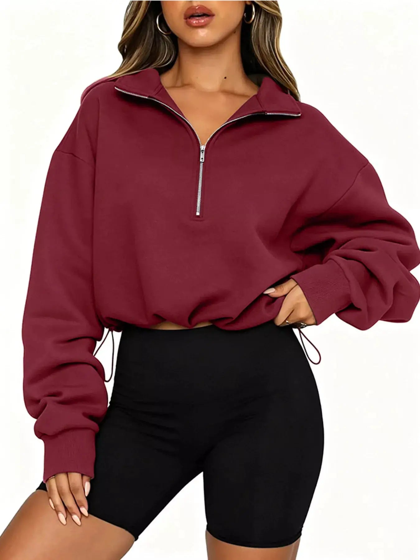 Half Zip Drawstring Hem Sweatshirt by Trendsi