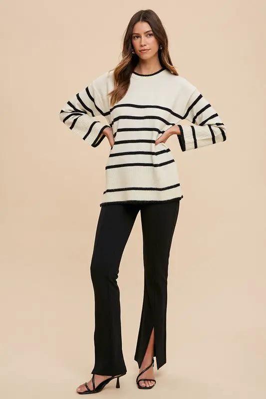 Annie Wear Side Slit Striped Round Neck Sweater by Trendsi