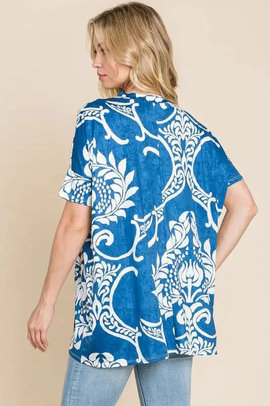 BOMBOM Printed Relaxed V-Neck Tunic Top by Trendsi