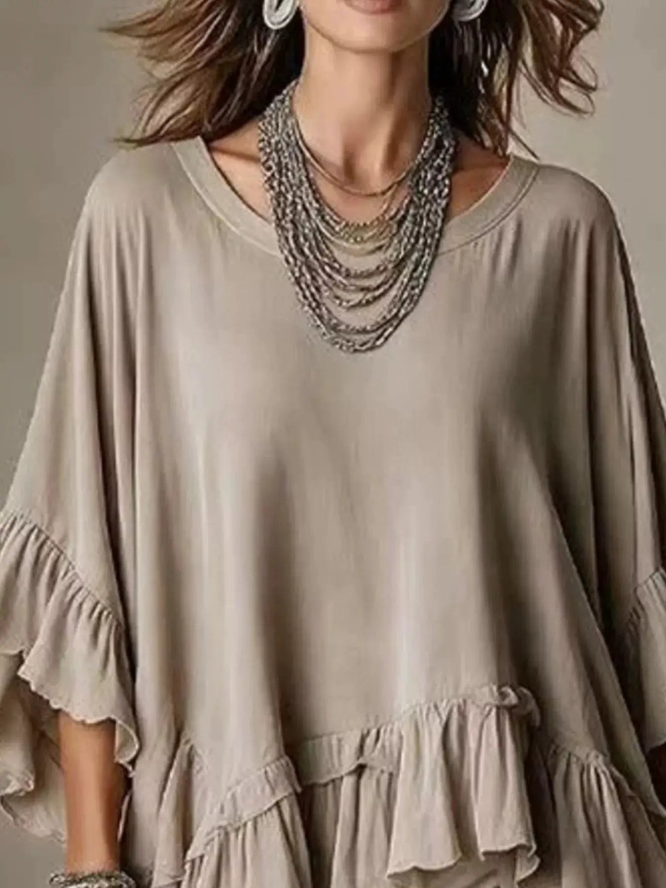 Ruffled Hem Loose Fit Top by Trendsi
