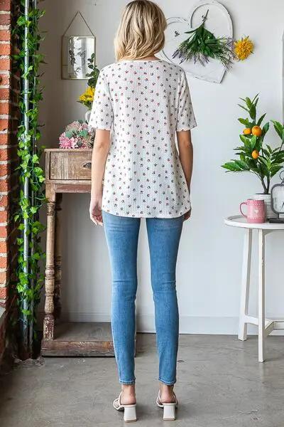 Heimish Full Size Crisscross Ditsy Floral Babydoll Top Plus Size by Trendsi