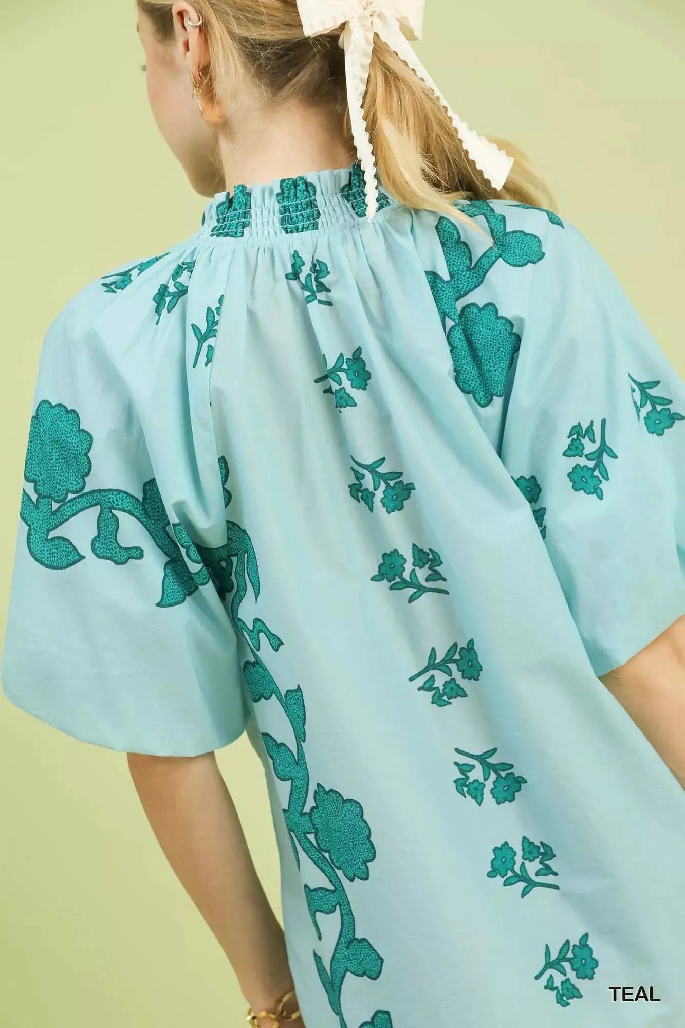 Umgee Floral Smocked Notched Puff Sleeve Blouse by Trendsi