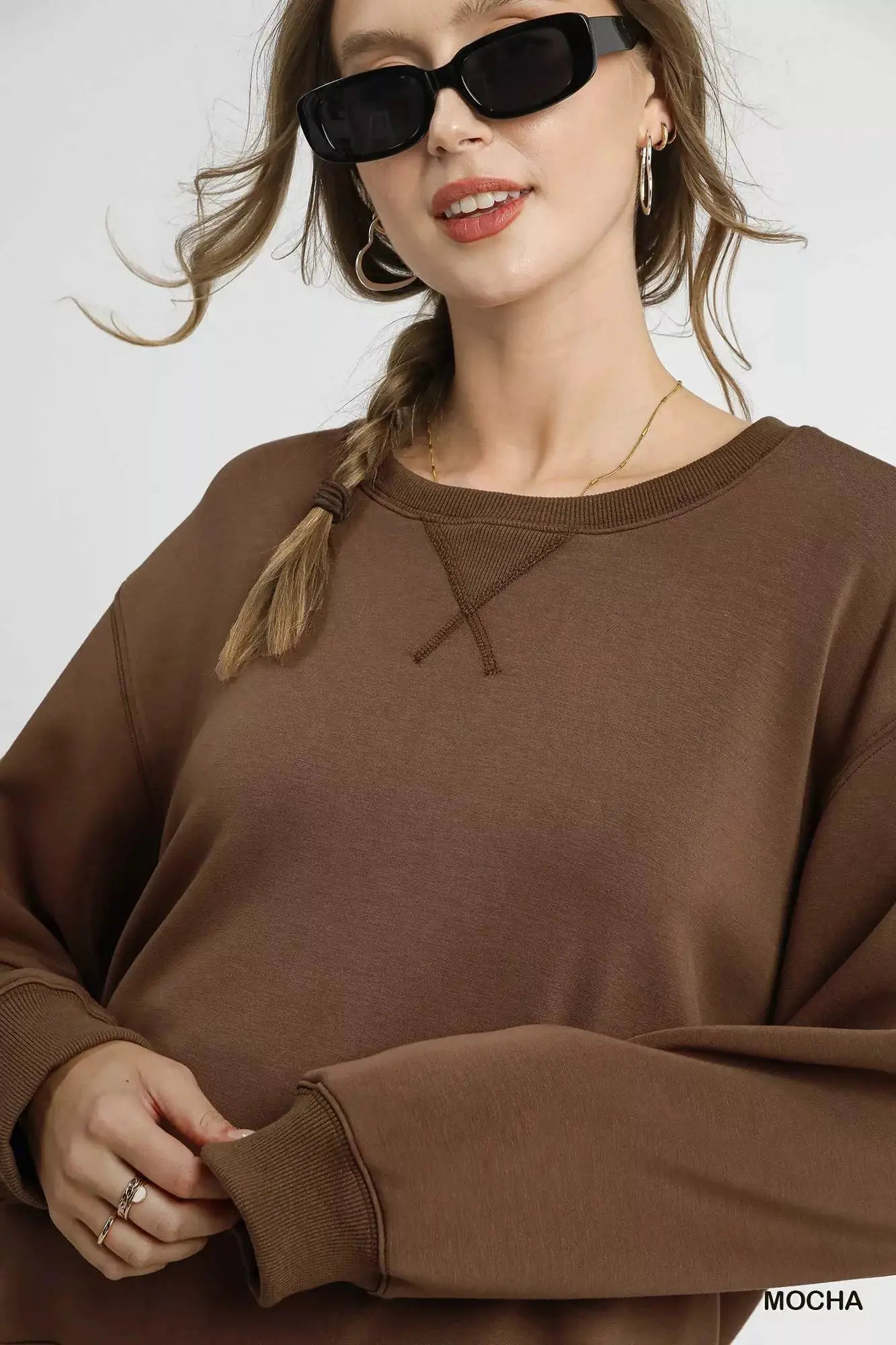 Umgee Round Neck Long Sleeve Fleece Sweatshirt by Trendsi