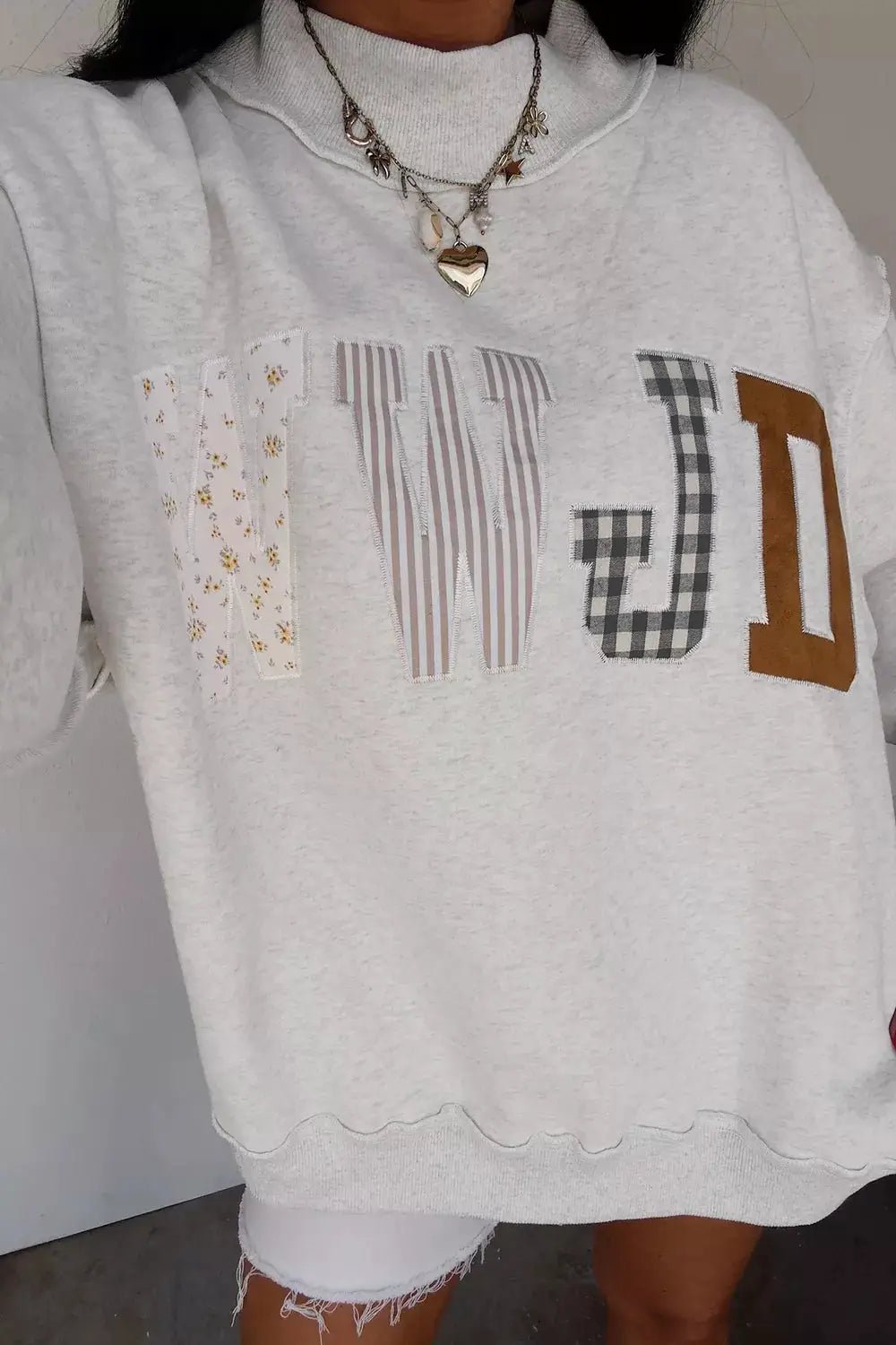 WWJD Mix Pattern Letter Graphic Exposed Seam Loose Sweatshirt - Bitsy Gypsy Boutique