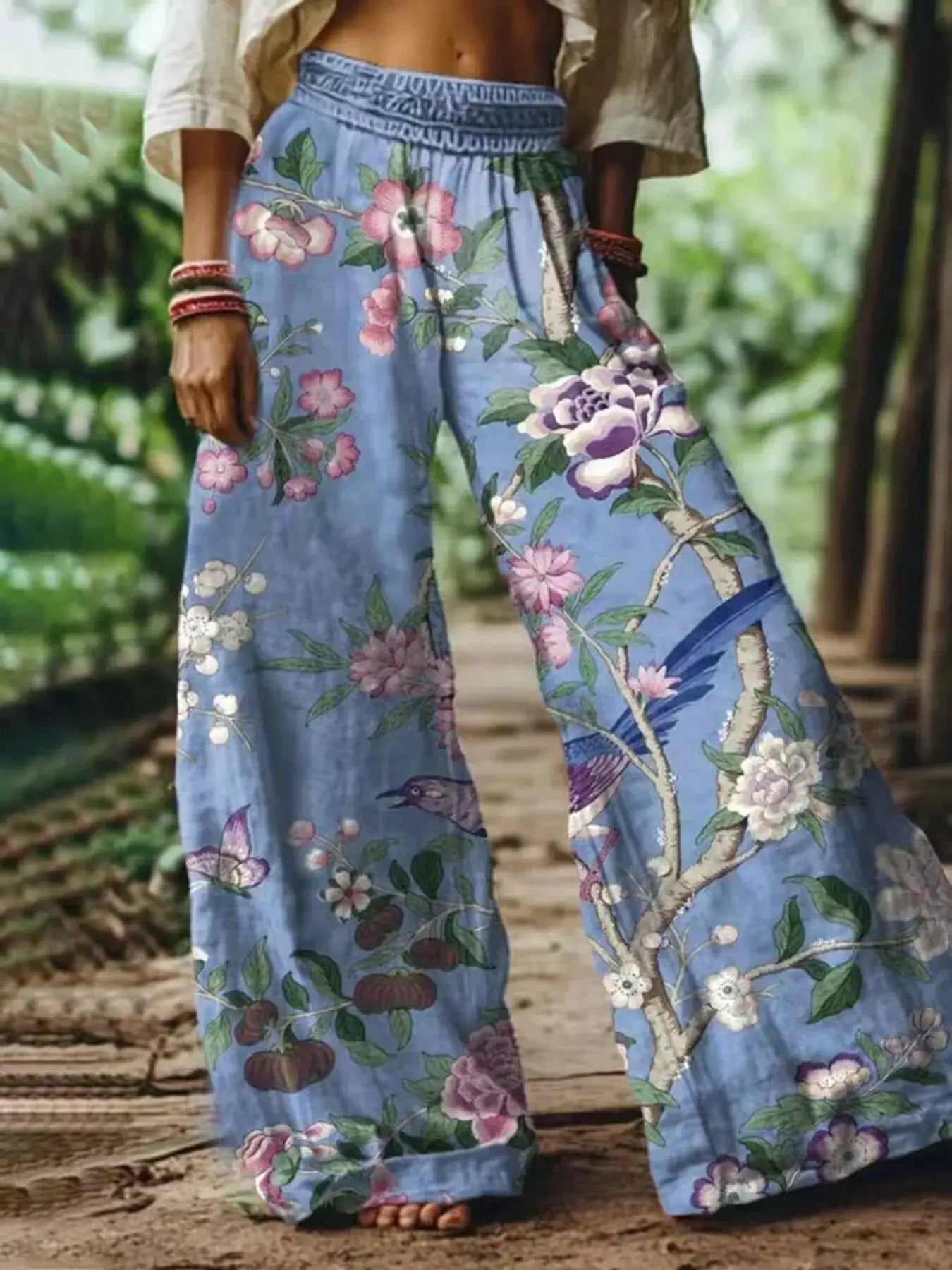 Full Size Floral Wide-Leg Pants Plus Size by Trendsi
