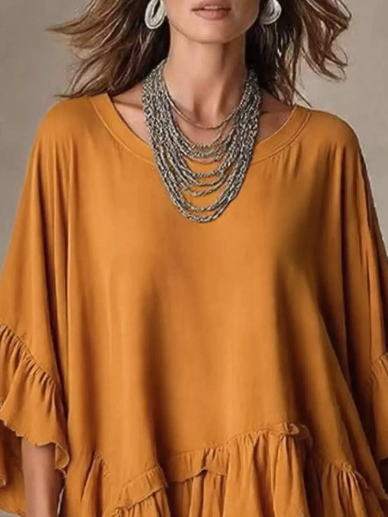 Ruffled Hem Loose Fit Top by Trendsi