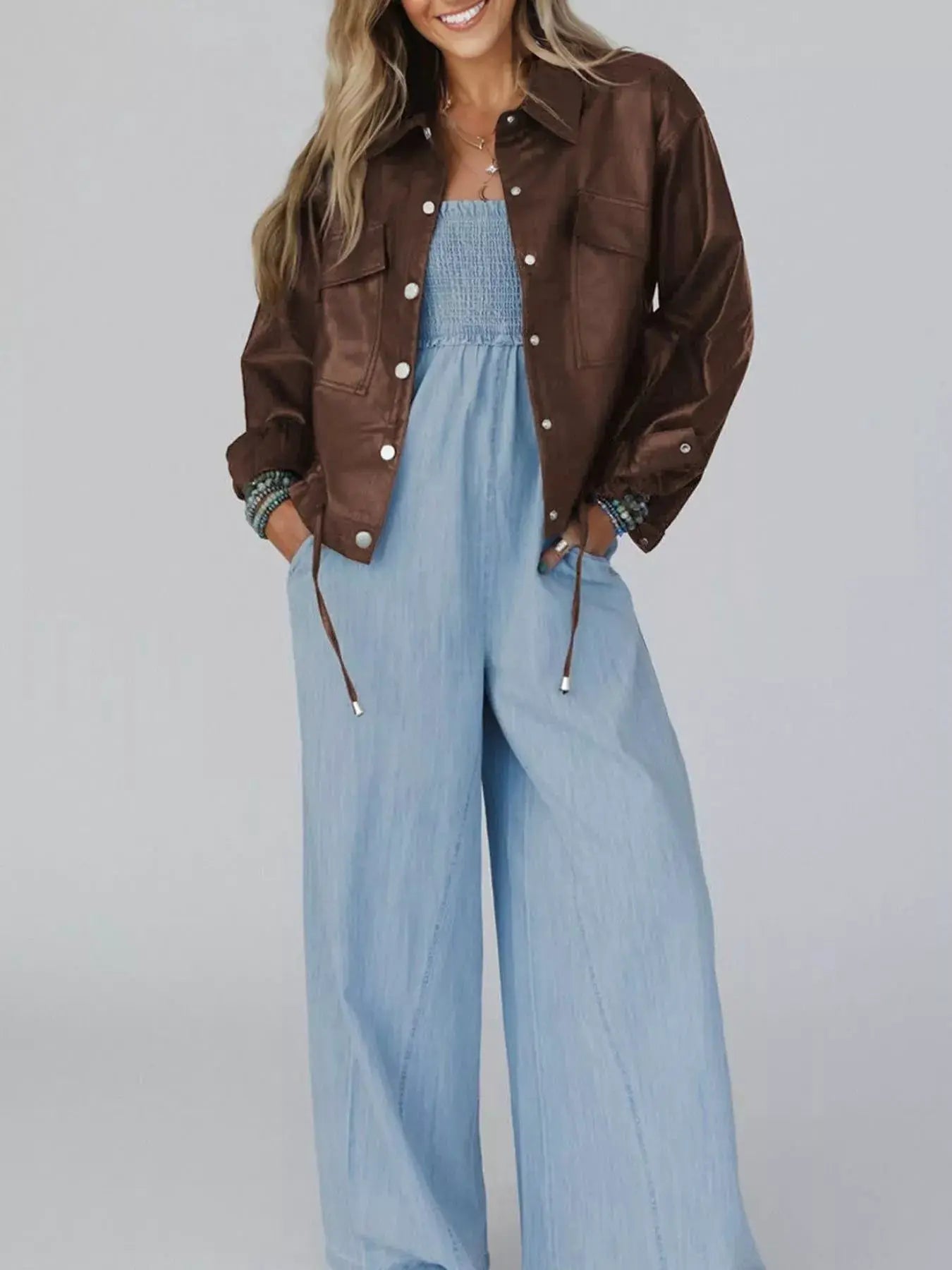 Double Flap Pocket Drawstring Hem Leather Jacket by Trendsi