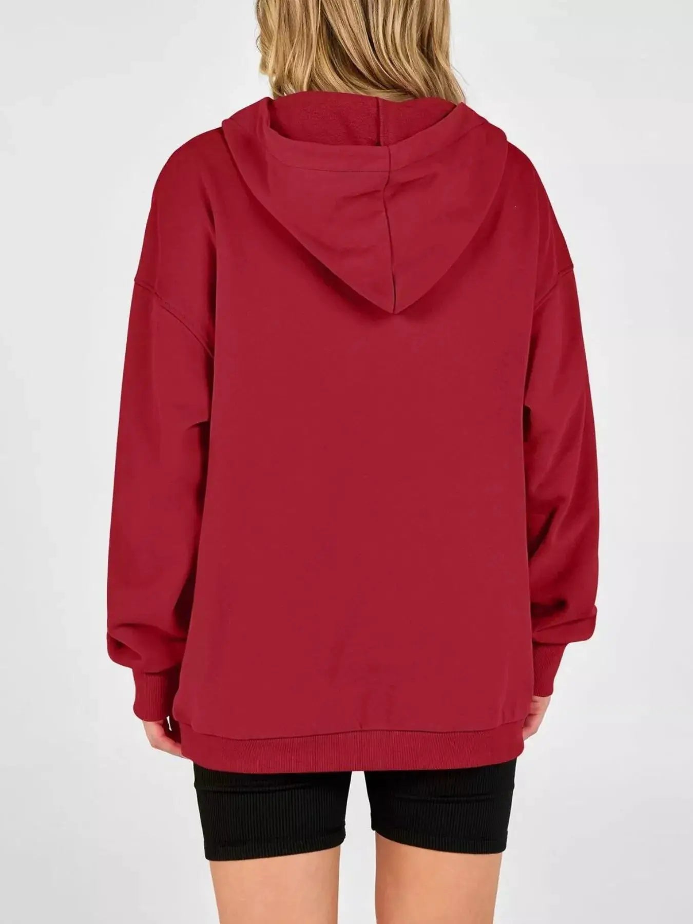 Half Snap Dropped Shoulder Hoodie by Trendsi