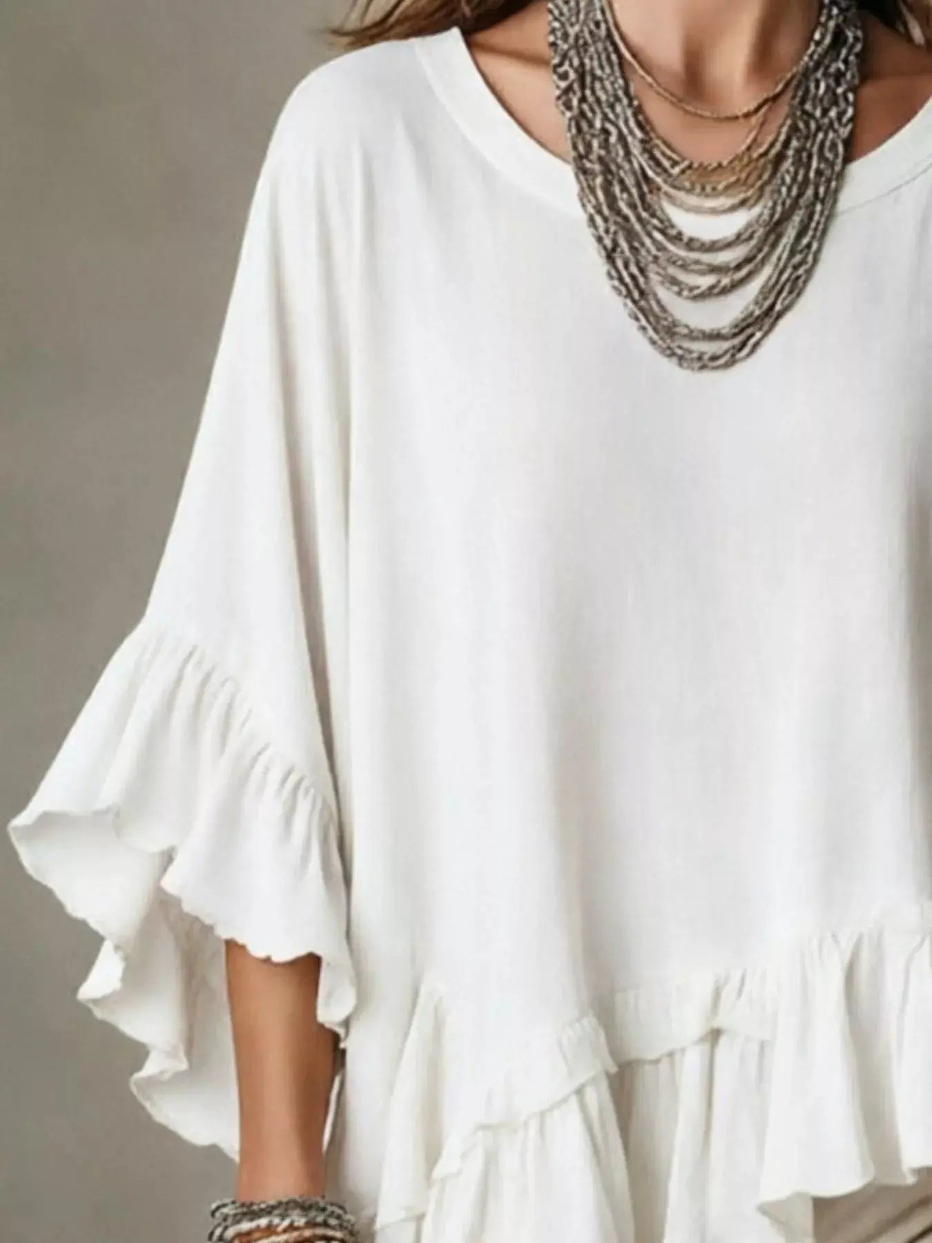 Ruffled Hem Loose Fit Top by Trendsi