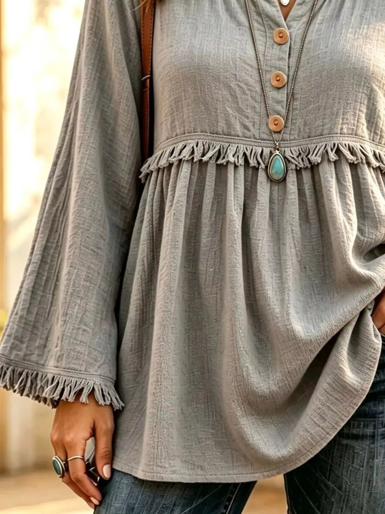 Button-Down Detail Fringed Hem Blouse by Trendsi