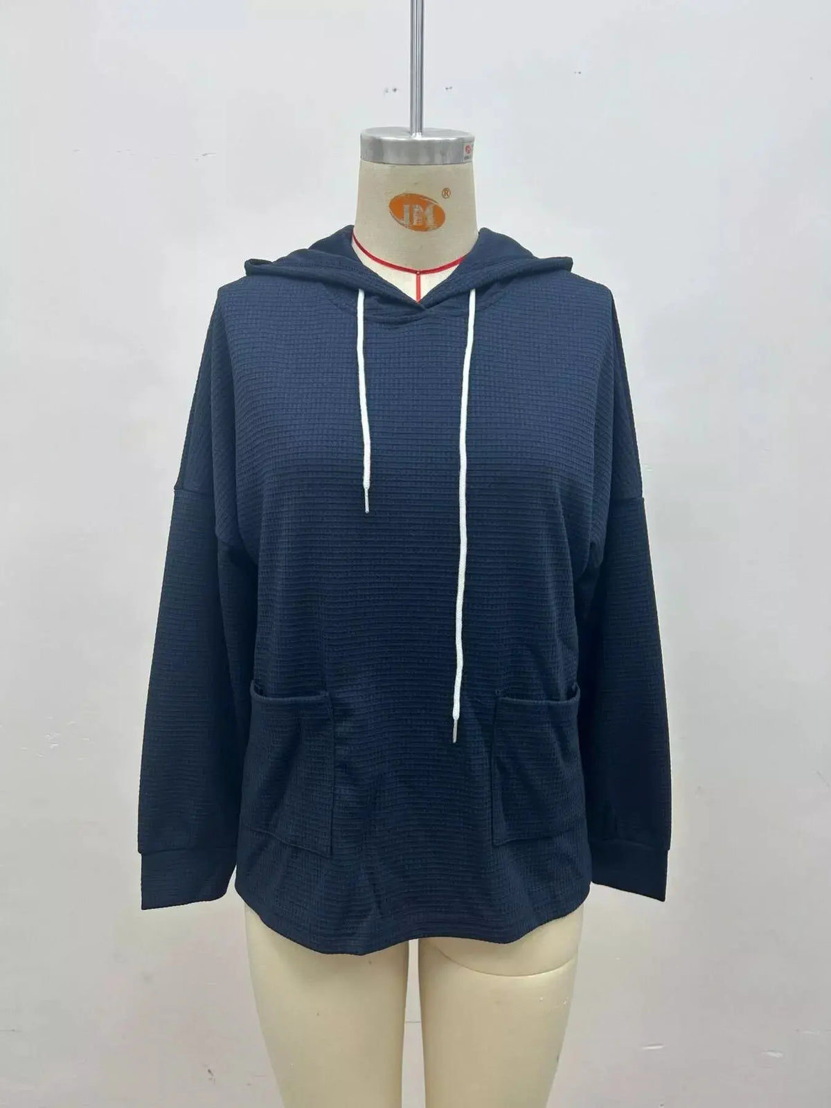 Full Size Waffle Knit Drawstring Long Sleeve Hoodie Plus Size by Trendsi