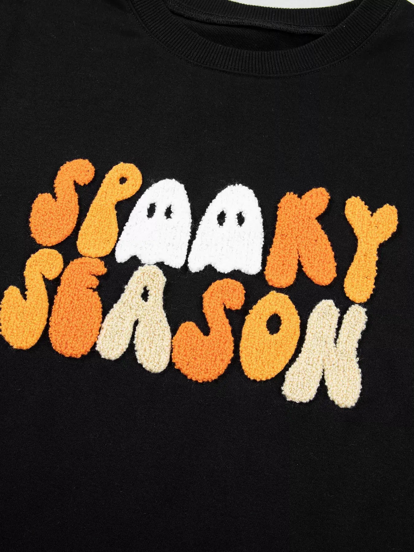 Embroidered Spooky Season Long Sleeve Round Neck Sweatshirt by Trendsi