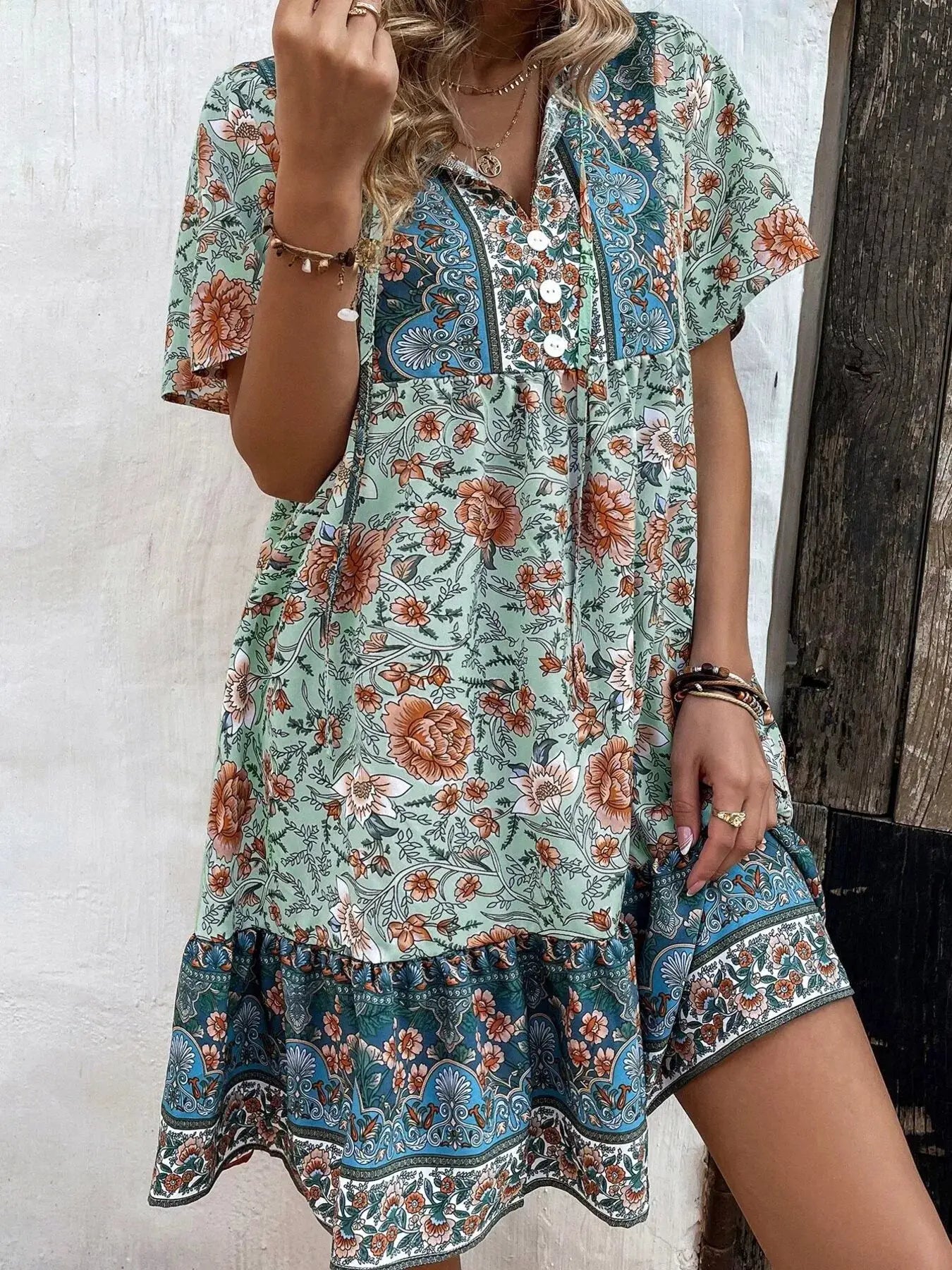 Floral Print Tie-Neck Ruffle Hem Mini Dress by Trendsi