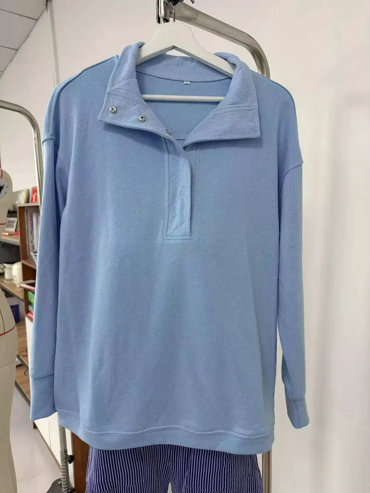 Half Snap Dropped Shoulder Sweatshirt by Trendsi