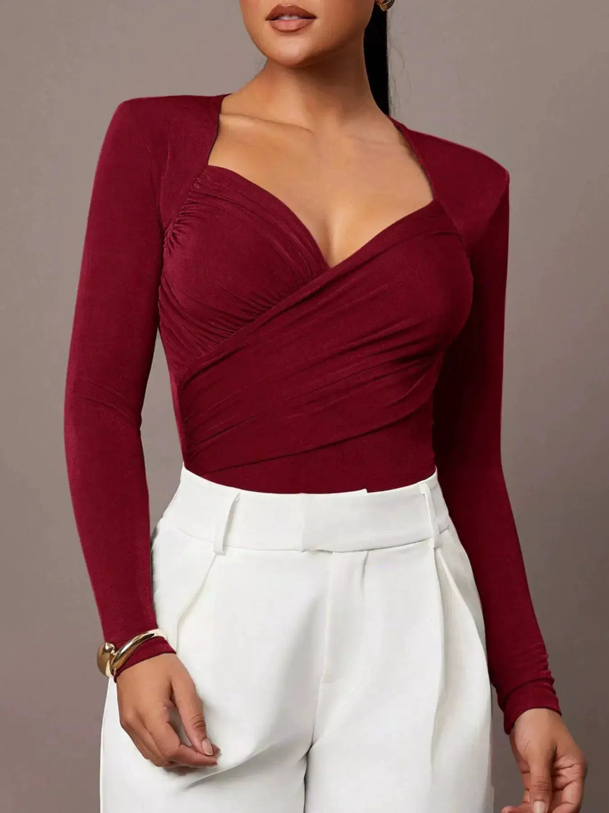 Ruched Surplice Long Sleeve Bodysuit by Trendsi