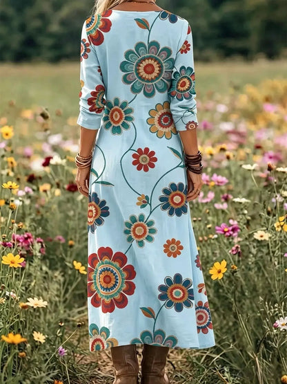 Floral Print V-Neck Long Sleeve Maxi Dress by Trendsi