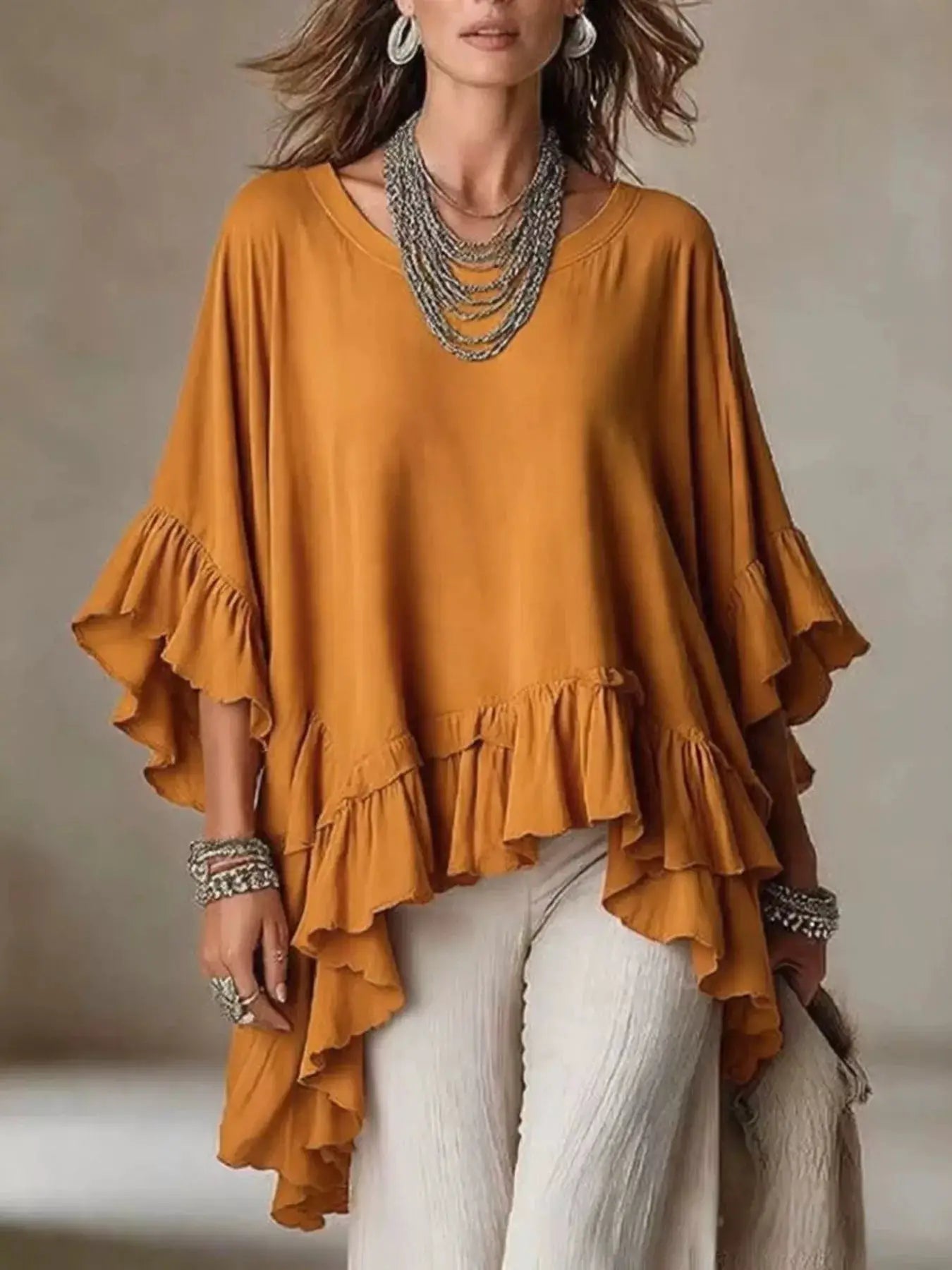 Ruffled Hem Loose Fit Top by Trendsi