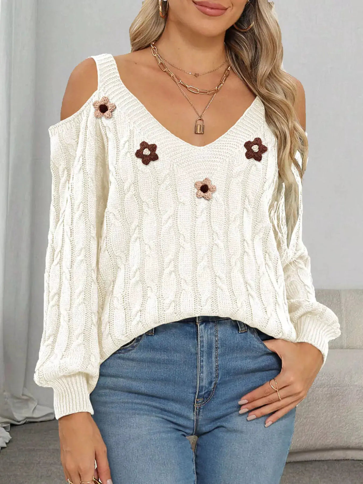 Floral Applique Cold Shoulder Cable Knit Sweater by Trendsi