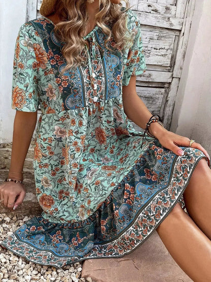 Floral Print Tie-Neck Ruffle Hem Mini Dress by Trendsi