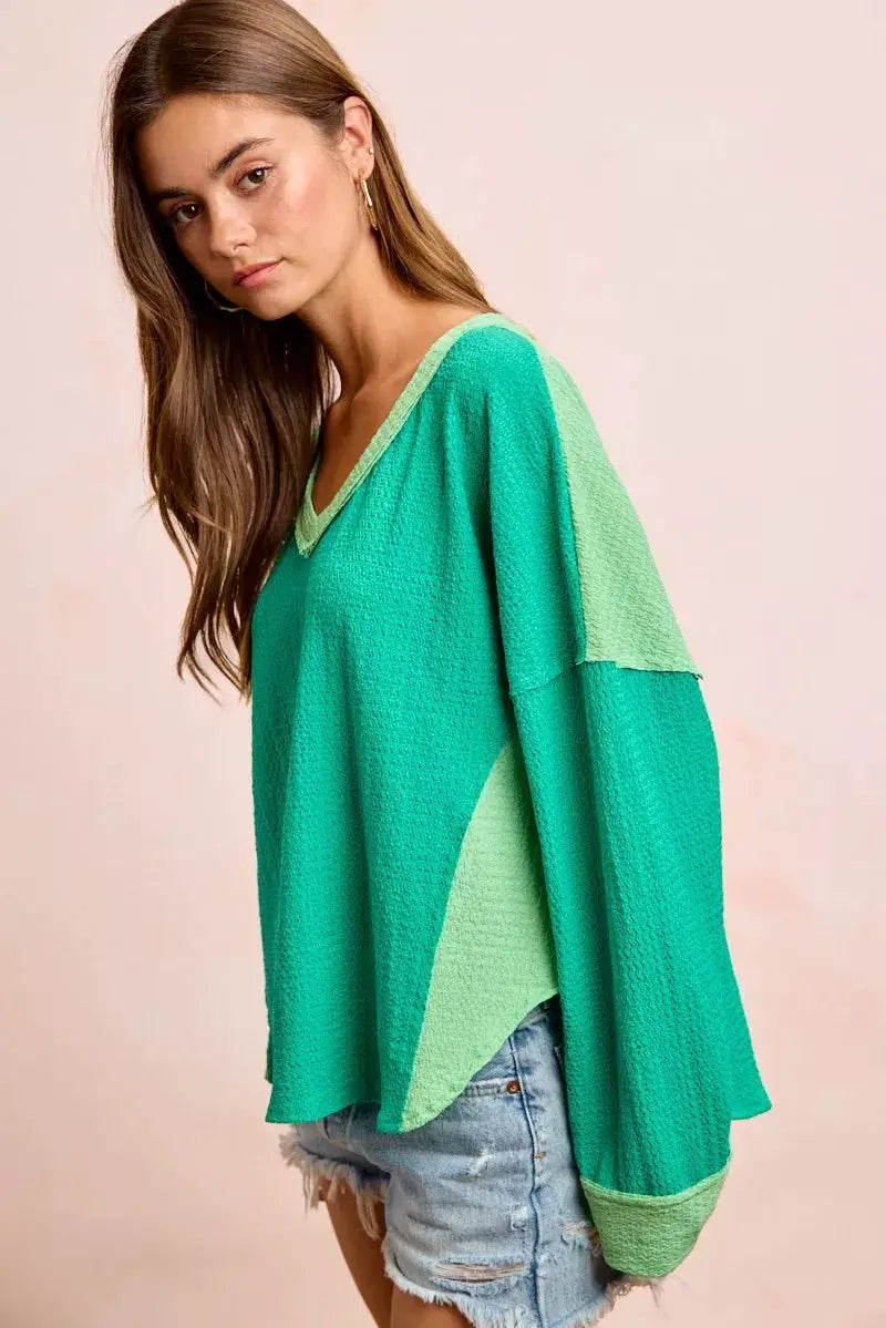 BiBi Textured Jersey Color Block Top With Cut Edge by Trendsi