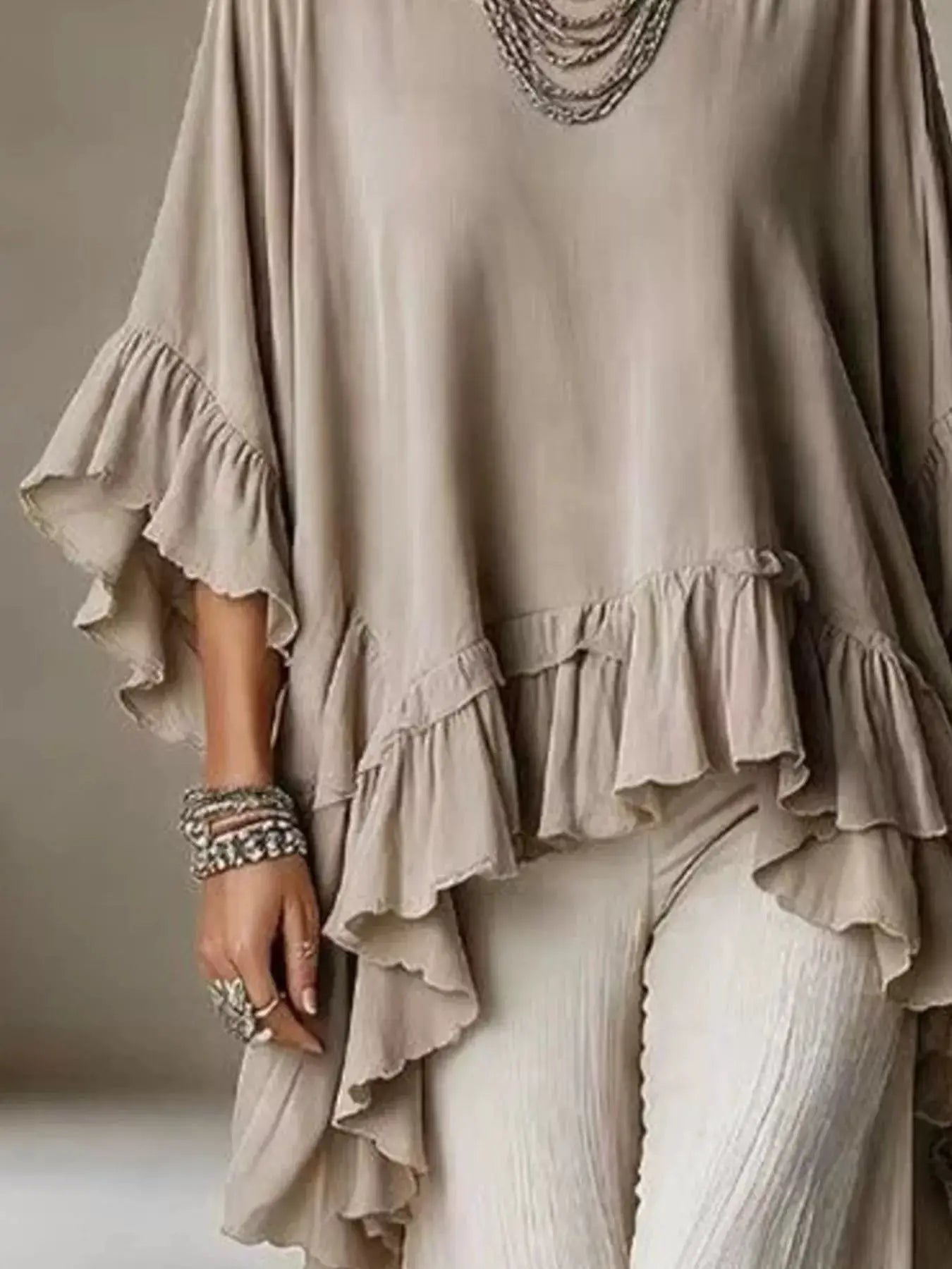 Ruffled Hem Loose Fit Top by Trendsi