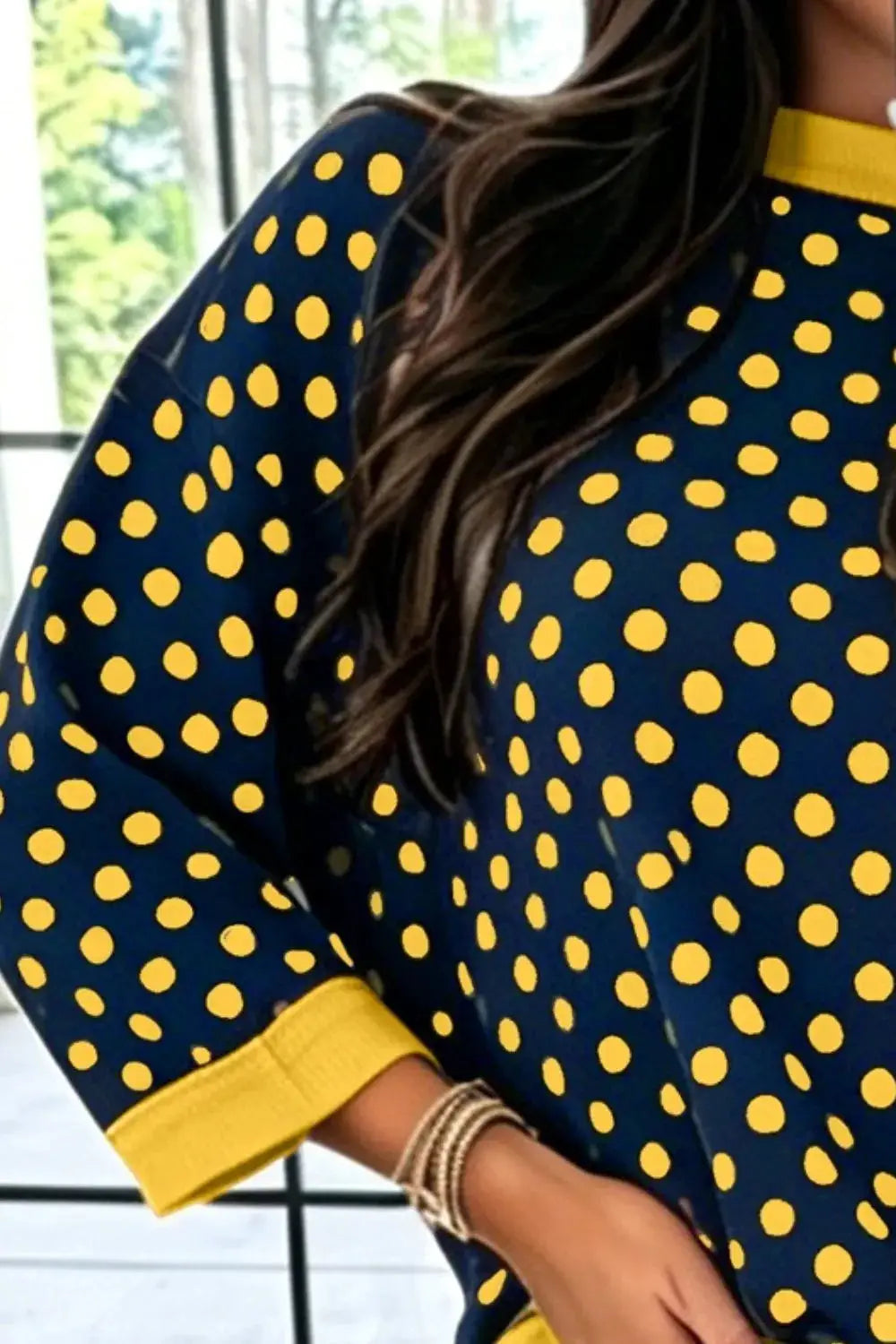 Polka Dot Sweatshirt with Contrast Trim by Trendsi
