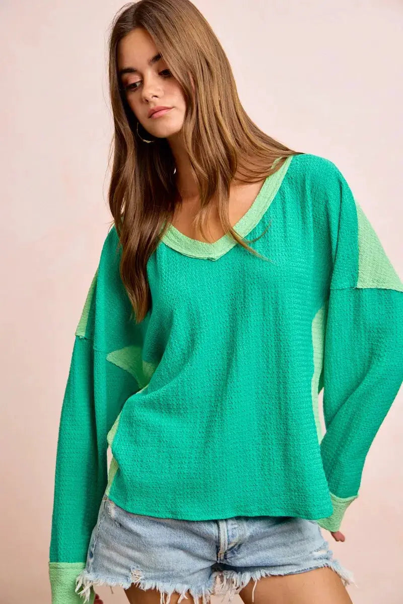 BiBi Textured Jersey Color Block Top With Cut Edge by Trendsi