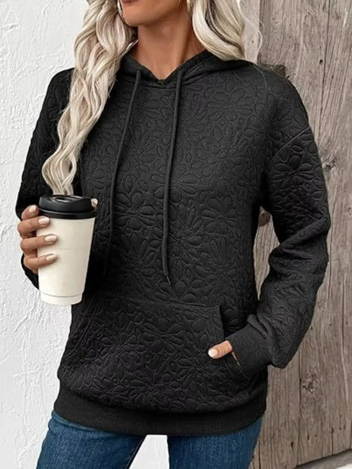 Textured Floral Embossed Drawstring Hoodie by Trendsi