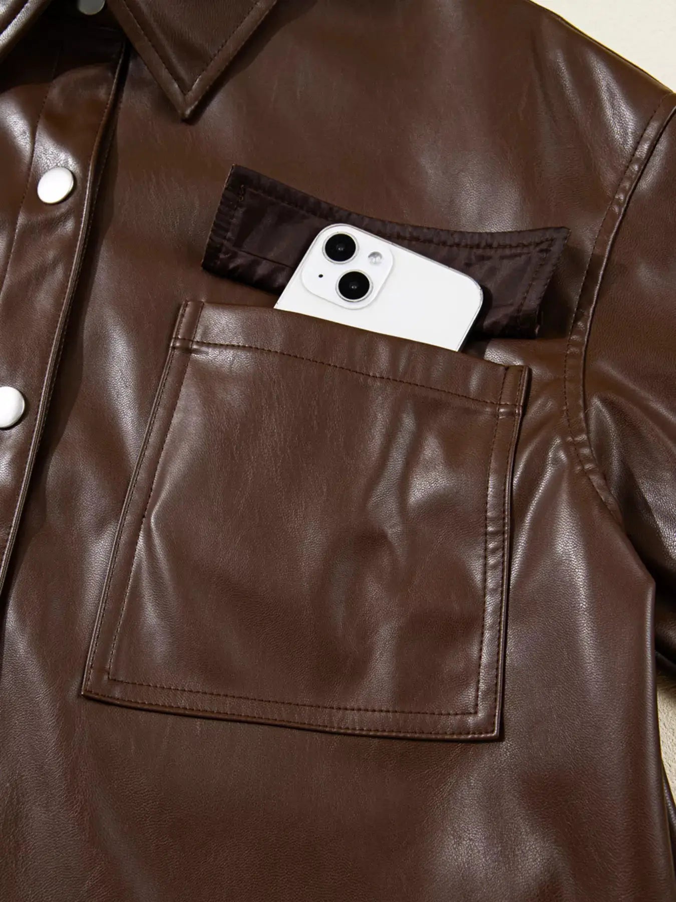 Double Flap Pocket Drawstring Hem Leather Jacket by Trendsi