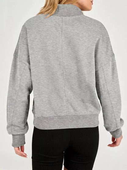 Half Snap Dropped Shoulder Sweatshirt by Trendsi