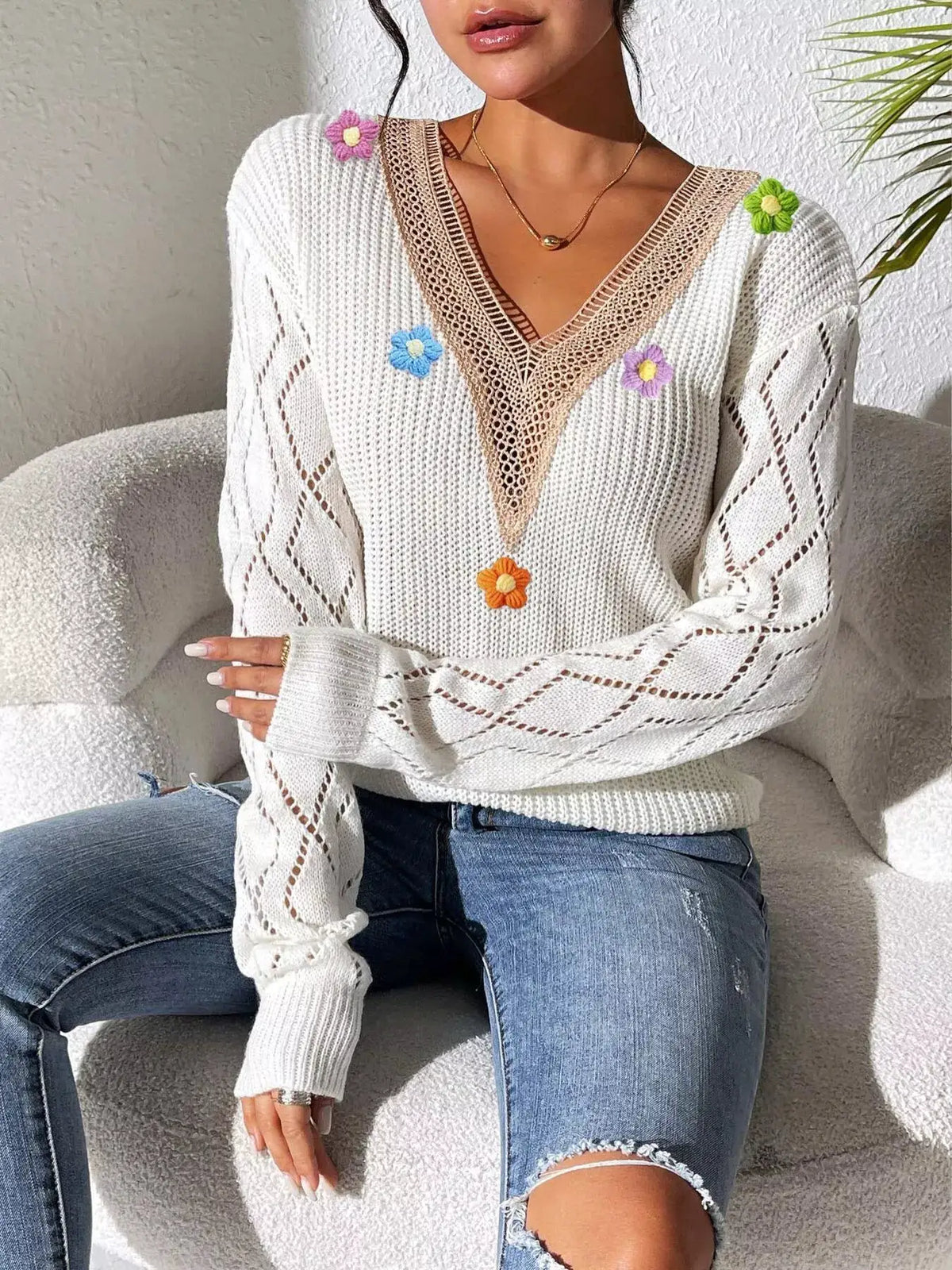 Floral Applique V-Neck Openwork Sweater by Trendsi