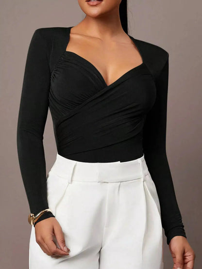 Ruched Surplice Long Sleeve Bodysuit by Trendsi