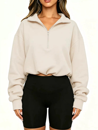 Half Zip Drawstring Hem Sweatshirt by Trendsi