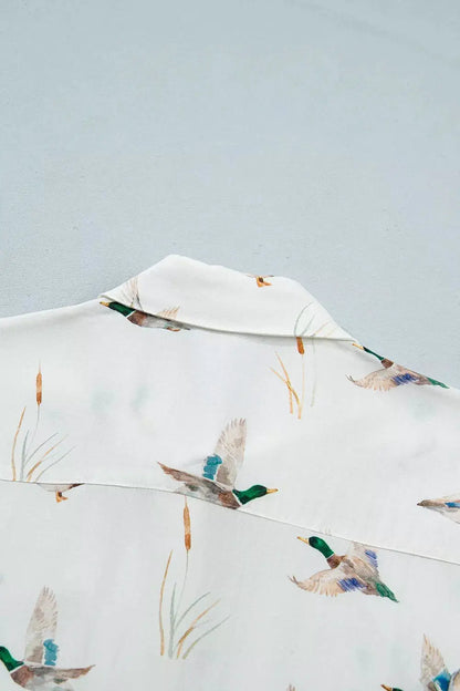 Mallard Printed Button Flap Pocket Short Sleeve Shirt by Trendsi