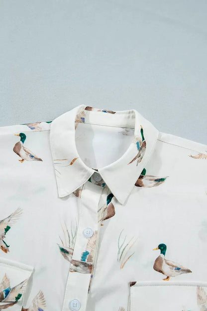 Mallard Printed Button Flap Pocket Short Sleeve Shirt by Trendsi