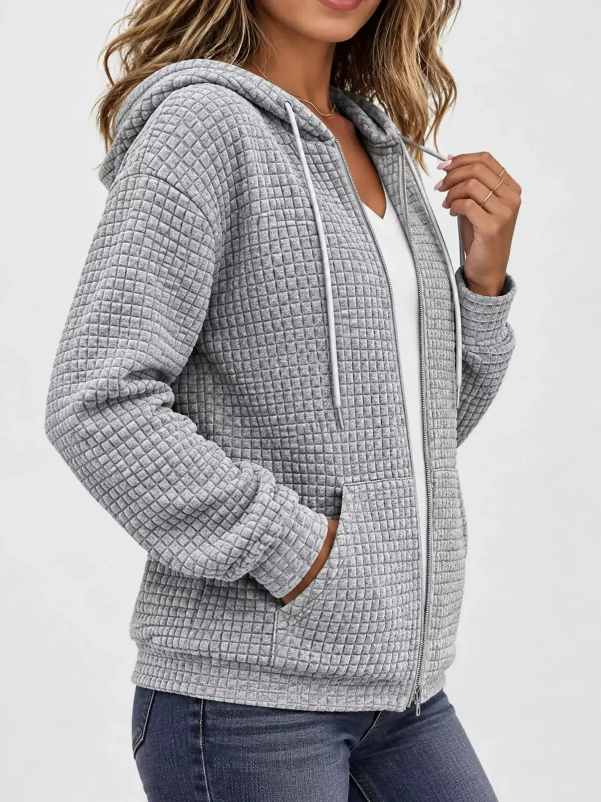 Waffle Knit Zip-Up Hoodie with Drawstring and Pockets by Trendsi