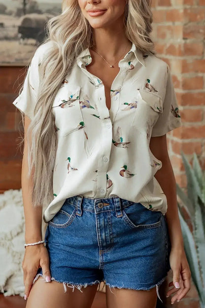 Mallard Printed Button Flap Pocket Short Sleeve Shirt by Trendsi