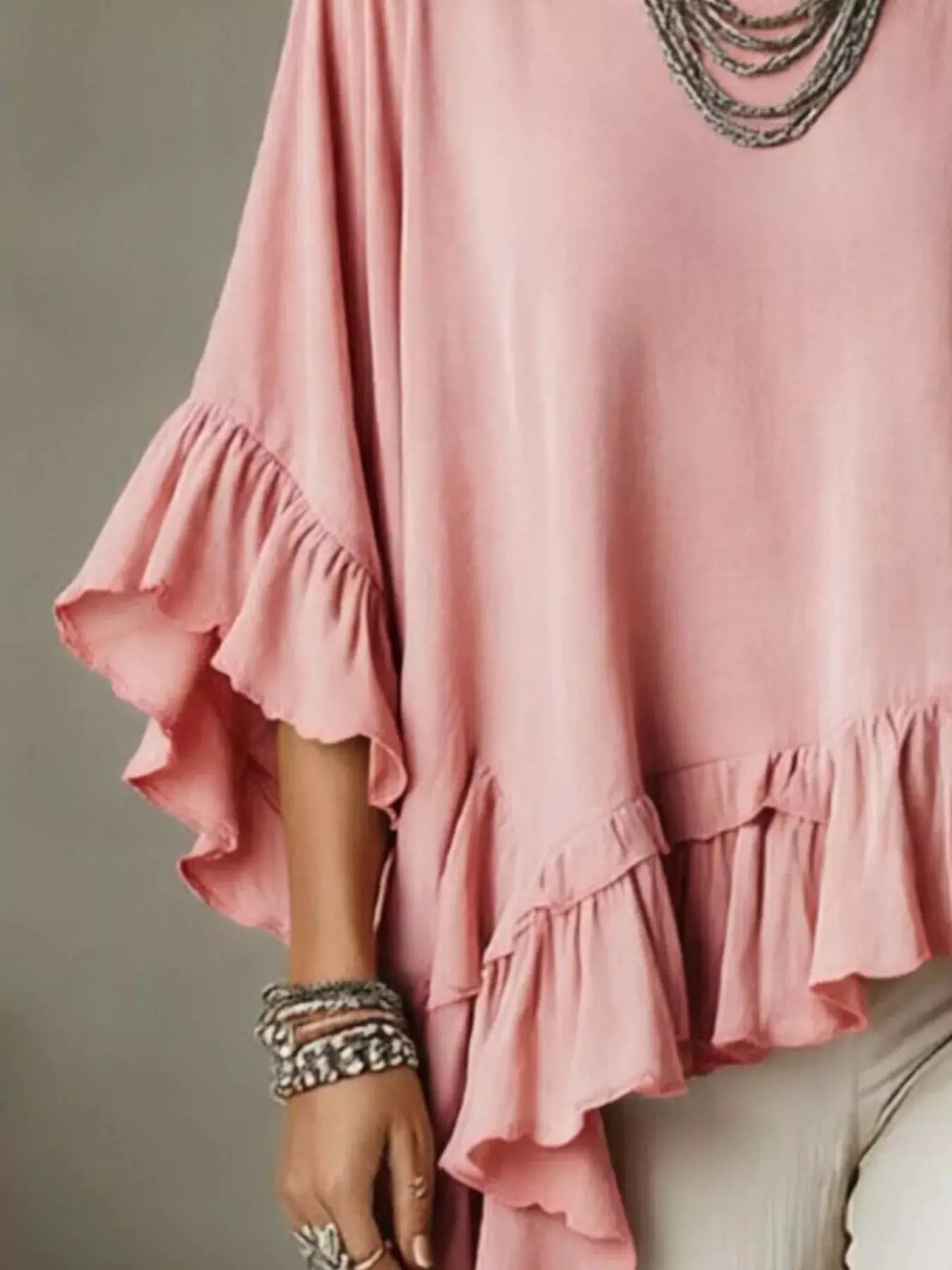 Ruffled Hem Loose Fit Top by Trendsi