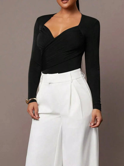 Ruched Surplice Long Sleeve Bodysuit by Trendsi