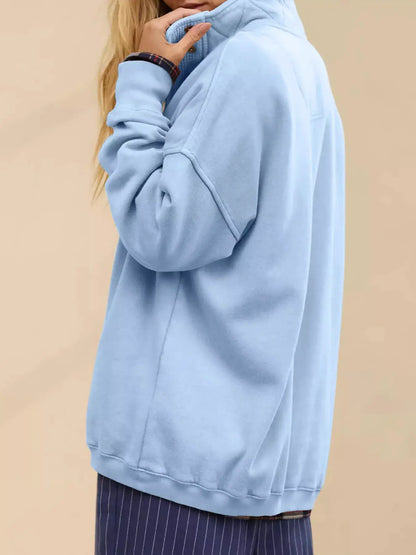Half Snap Dropped Shoulder Sweatshirt by Trendsi