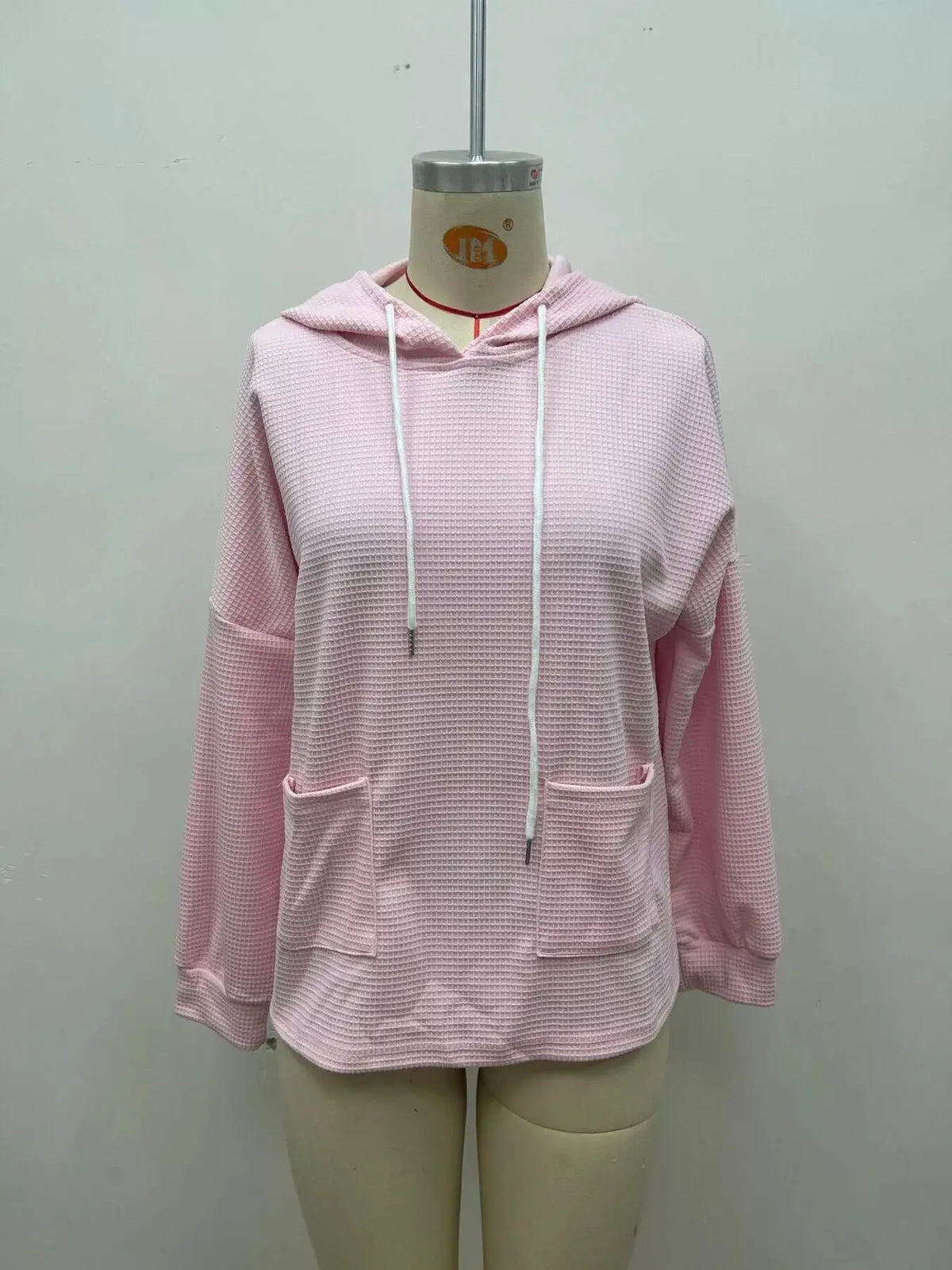 Full Size Waffle Knit Drawstring Long Sleeve Hoodie Plus Size by Trendsi