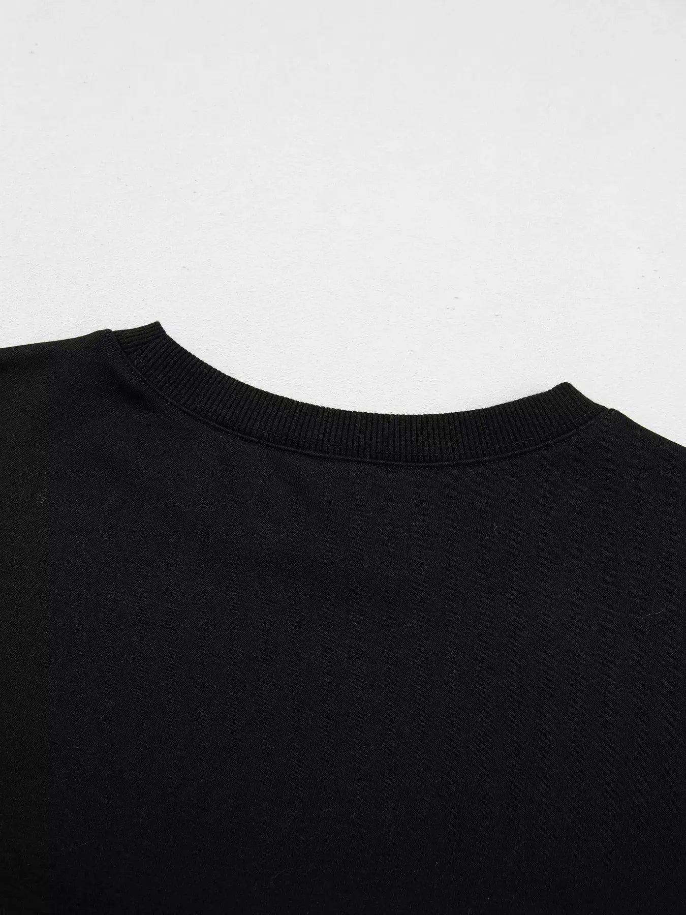 Embroidered Spooky Season Long Sleeve Round Neck Sweatshirt by Trendsi