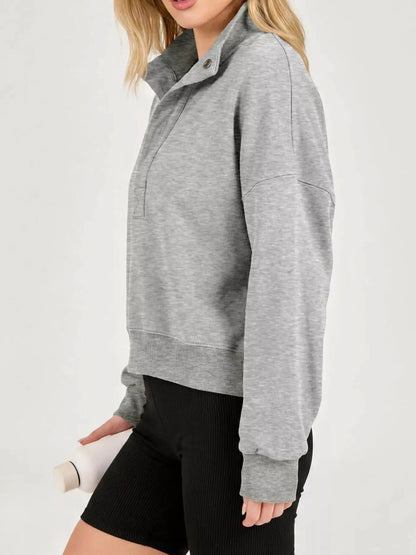 Half Snap Dropped Shoulder Sweatshirt by Trendsi