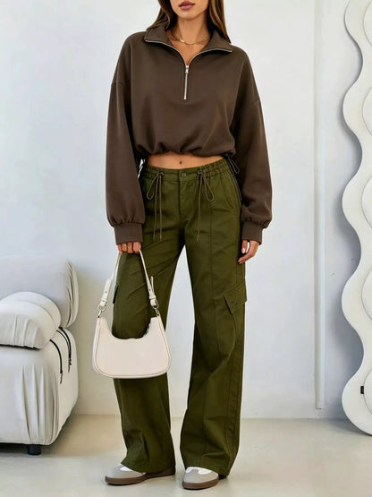 Half Zip Drawstring Hem Sweatshirt by Trendsi