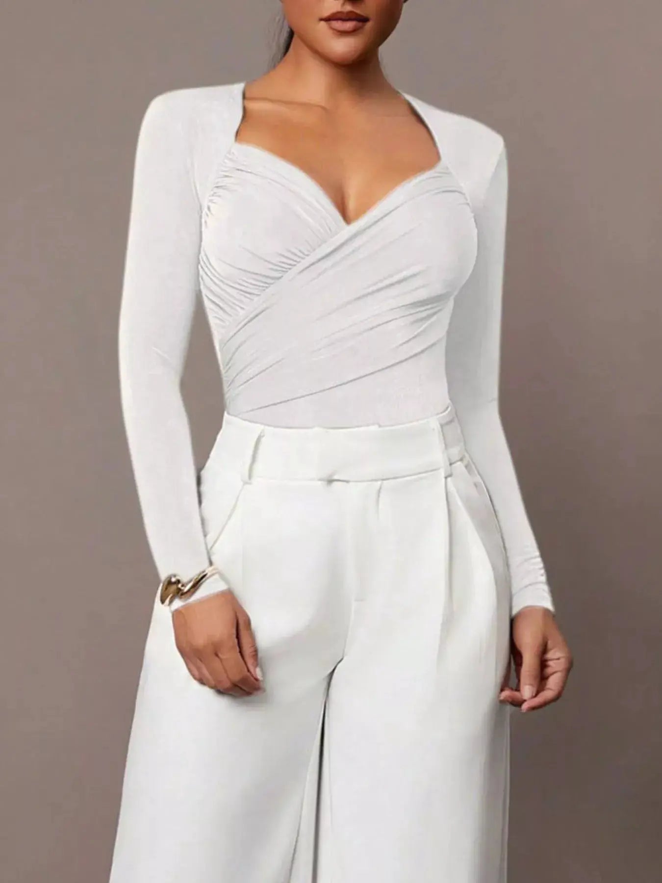 Ruched Surplice Long Sleeve Bodysuit by Trendsi