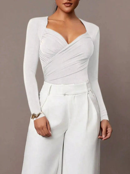 Ruched Surplice Long Sleeve Bodysuit by Trendsi